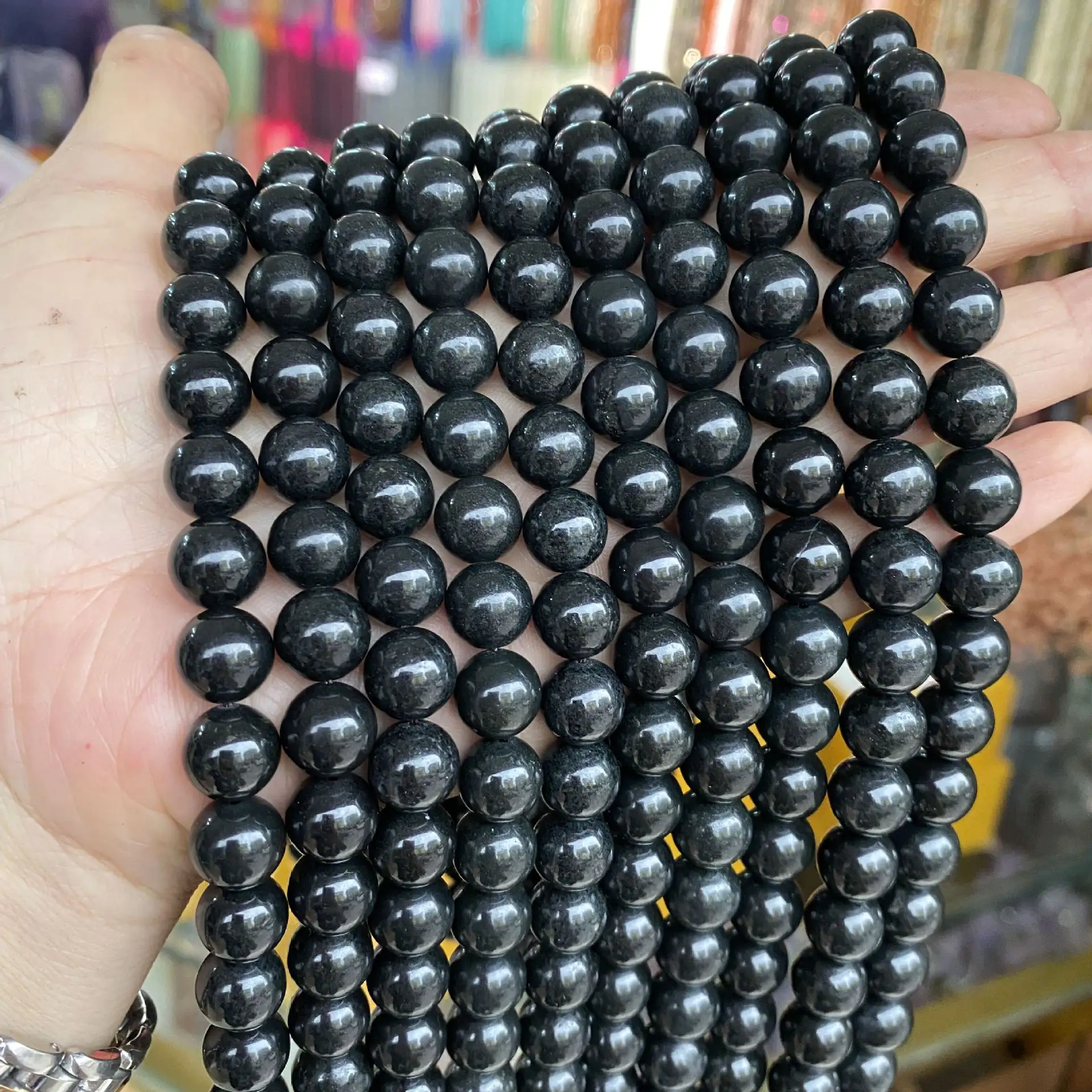 Großhandel leitfähige Stein perlen Schungit lose Perlen Stränge für die Schmuck herstellung