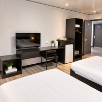Maison préfabriquée pliable à aménagement intérieur moderne, maison-conteneur portable pour hôtel, complexe hôtelier, installations sanitaires et hébergement