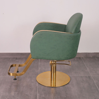 Équipement de coiffure durable, chaise de barbier rotative de luxe moderne pour salon de beauté, chaise de coiffure verte dorée pour salon de coiffure