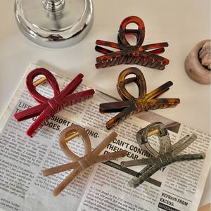 Pince à cheveux nœud papillon géométrique simple en plastique de 7 cm, accessoire de mode classique couleur unie - Product Image 1