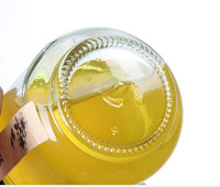 Pot en verre transparent en gros pour miel, confiture, cornichons, avec couvercle métallique
