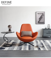 Fauteuil de détente moderne avec revêtement en cuir et base en acier inoxydable pour salon et hôtel