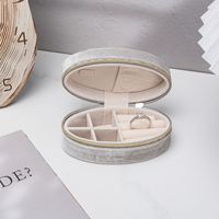 Boîte à bijoux ovale de luxe en velours avec fermeture éclair, mini sac de rangement portable pour bagues et boucles d'oreilles, idéal pour les voyages