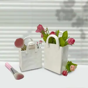 Customized Modern Ceramic White Bag Shape Vase Handmade Carved Makeup Brush Holder and Pen Storage Pottery & Enamel