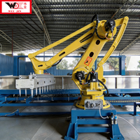Nouveau robot d'usine automatique 2026 pour le déchargement et la palettisation de blocs de caoutchouc, optimisant la productivité