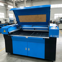 Machine de découpe laser CO2 pour le traitement de l'acrylique, la découpe de tissus et la gravure de motifs 100W 150W