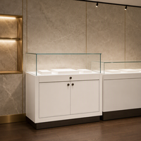 Comptoir de présentation de bijoux en verre GZowin avec éclairage LED, vitrine de vente au détail durable pour les bijouteries