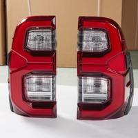 Feux arrière LED rouges/transparents/fumés JOP4X4 pour Toyota Hilux Revo 2015-2024 avec logo Hilux