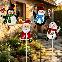 Ensemble fantaisie de 4 décorations de jardin en métal en forme de pingouin, Père Noël, bonhomme de neige et canne à sucre pour extérieur, pelouse et porche