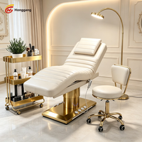 Table de massage électrique ergonomique professionnelle réglable en hauteur pour spa, avec LED, luxe moderne, pour hôtel et institut de beauté