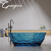 Baignoire autoportante de luxe moderne Cpingao en pierre, avec ondulations d'eau en résine transparente et drain intégré, idéale pour hôtels, villas et complexes hôteliers