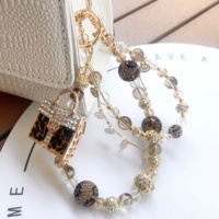 Chaîne de téléphone portable en perles léopard et strass, décoration de sac, porte-clés de luxe DIY personnalisable, vente en gros