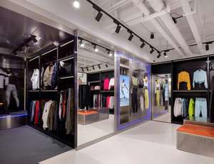 Exhibidores de Ropa Deportiva Modernos y Personalizados para Tiendas, Estante de Supermercado para Pantalones y Calcetines con Accesorios Metálicos - Product Image 1