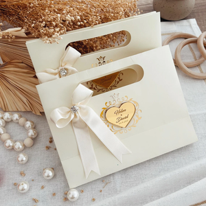 Premium personnalisé luxe merci faveur de fête de mariage petite entreprise sac en papier personnalisé Sac Cadeau Mariage sacs-cadeaux avec nœud - Product Image 1