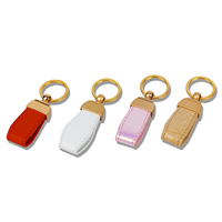 Porte-clés en cuir gaufré de luxe pour clés de voiture de luxe avec design personnalisé et détails en feuille d'argent Cadeau