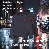 Blouson universitaire pour homme OEM en gros, hiver, style urbain, à fermeture éclair, séchage rapide, en toile enduite, col montant, patchwork sur le devant, personnalisable