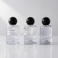 Flacon d'échantillon de parfum sphérique noir en verre de 30 ml avec bouchon à vis, personnalisable, portable, vide, avec pompe pulvérisatrice – En stock