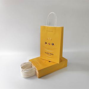KM High Quality Yellow Smile Gift <b>Bags</b> Paper <b>Bag</b> with Tissue Paper for Birthday Baby Shower and Christmas <b>Party</b> - Product Image 2