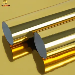 Commercio all'ingrosso di alta qualità Golden PET pellicola di trasferimento di calore in oro e argento PET DTF pellicola stagnola per la stampa di tessuto tessile