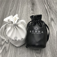 Pochette cosmétique de luxe en cuir blanc avec cordon de serrage, sacs cadeaux à fond rond, sacs anti-poussière en similicuir pour dés, parfums, chaînes, clés et bijoux