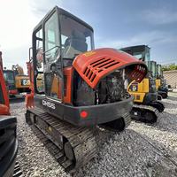 Excavadora de orugas mini Doosan DH55 original usada de Corea, 5.5 toneladas, pocas horas, en stock, con motor y bomba para construcción agrícola y movimiento de tierras.