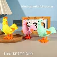 Coq coloré à ressort avec mécanisme d'enroulement - Jouet pour enfants en forme de poussin sauteur