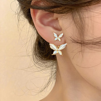 Femmes crème blanc perlé émail fleur coeur forme boucles d'oreilles diamant incrusté bijoux de mode en vrac en gros papillon