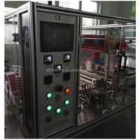 Machine d'emballage automatique pour boîtes de collations, films plastiques, étuis CD, boîtes de thé, emballage de parfums, emballage de téléphones portables