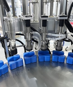 Machine de remplissage et de bouchage rotative multi-têtes sous vide pour liquides parfumés - Product Image 4