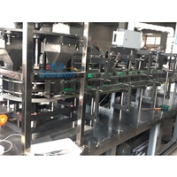 Machine de remplissage automatique de boîtes de poudre à lessive, machine d'emballage de boîtes de poudre à lessive, machine d'emballage de cartons de poudre à lessive