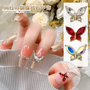 Ciondoli per unghie a farfalla di alta qualità rosso bianco AB cristallo zircone pietra di vetro decorazione per unghie farfalla 3d nail art design