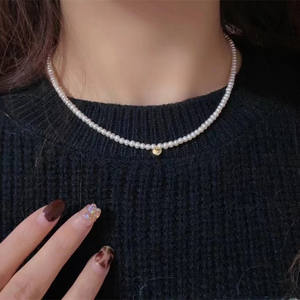 Collier pour femme en perles de millet d'eau douce naturelles au design simple et frais, avec pendentif en œil de chat, chaîne de clavicule, colliers de perles - Product Image 4