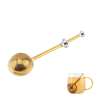 Vente en gros 304 Filtre à mailles en forme de bille en acier inoxydable Poussoir pour théière à long manche Infuseur à thé réutilisable à usage domestique