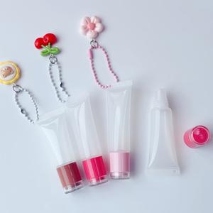 Tubos de Plástico Transparente de 5g/10g/15g para Bálsamo Labial, Tubos Exprimibles con Tapa de Rosca para Brillo Labial, Crema para Ojos y Limpiador Facial con Llavero - Product Image 3