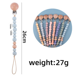 Cadena para chupete de bebé, cuentas de madera de silicona azul, sin BPA, de 0 a 12 meses - Product Image 4