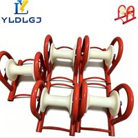 Outil de guidage de câble droit industriel YILI avec rouleau en nylon durable, cadre en acier robuste et poulie au sol pour un tirage de câble fluide