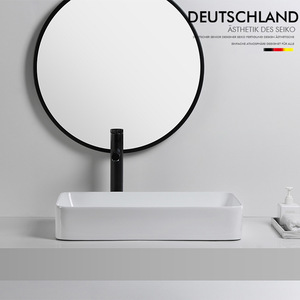 Lavabo Rectangular de Cerámica Deutschland con Drenaje Lateral, Fácil de Limpiar, para Instalación en Encimera de Baño - Product Image 1