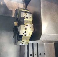 Petit tour CNC TCK6340 unité de broche à double coupe avec mandrin hydraulique adapté à l'usinage de roulements et d'engrenages