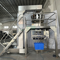 Machine d'emballage automatique haute vitesse pour cacahuètes, noix et bonbons avec peseuse multi-têtes et système de mise en sachet et de scellage