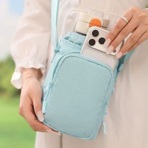 Mochila de Hidratación para Exteriores, Bolsa para Botella de Agua con Compartimento Aislado y Funda para Teléfono, Nailon Resistente para Senderismo, Viajes y Ciclismo - Product Image 4