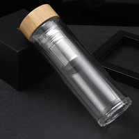 Bouteille d'eau en verre à double paroi écologique la plus vendue 2025 avec infuseur à fruits et thé, couvercle classique, personnalisable, unisexe, compatible eau bouillante