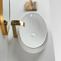 Lavabo en céramique blanc crème de qualité hôtelière de luxe avec motif artisanal pour projet de salle de bain d'hôtel de charme