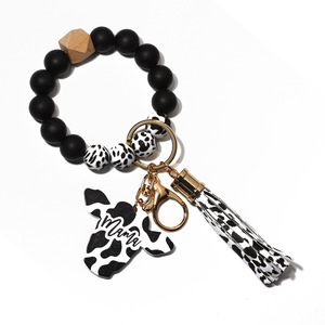 Nouveau bracelet en perles <span class=keywords><strong>de</strong></span> silicone pour hommes porte-clés <span class=keywords><strong>de</strong></span> style occidental tête <span class=keywords><strong>de</strong></span> vache à <span class=keywords><strong>copeaux</strong></span> <span class=keywords><strong>de</strong></span> <span class=keywords><strong>bois</strong></span> MAMA - Product Image 1