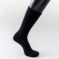 Vente en gros de chaussettes JISEN en coton de couleur noire et blanche unisexe avec logo personnalisé