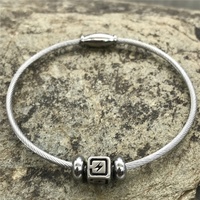 Bracelet Yiwu Aceon en acier inoxydable avec câble torsadé, fermoir magnétique ovale, double perle d'espacement, centre carré, cube estampé, éclairé