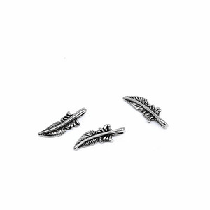 Perles d'espacement vintage en acier inoxydable Yunnique en forme de feuille de 1,5 mm pour la fabrication de bracelets et la création de bijoux - Product Image 1