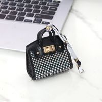Petit sac de maison le plus vendu avec cuir PU, multicolore, couleur platine, porte-clés, petit sac, pendentif