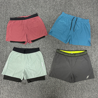 Shorts de sport OEM ODM pour femmes, entraînement, exercice, short de course 2-en-1 avec doublure et poche, 7 pouces, taille haute, pour hommes, course à pied, marathon