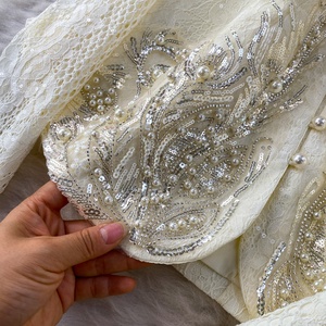 Traje de mujer de moda nueva primavera 2026 al por mayor: Top de encaje con cuello en V estilo francés elegante y falda de cola de pez de cintura alta. - Product Image 6