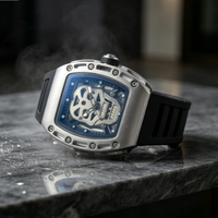 Montre mécanique automatique à cadran crâne creux, boîtier tonneau, bracelet en caoutchouc, montre-bracelet de luxe sport pour homme